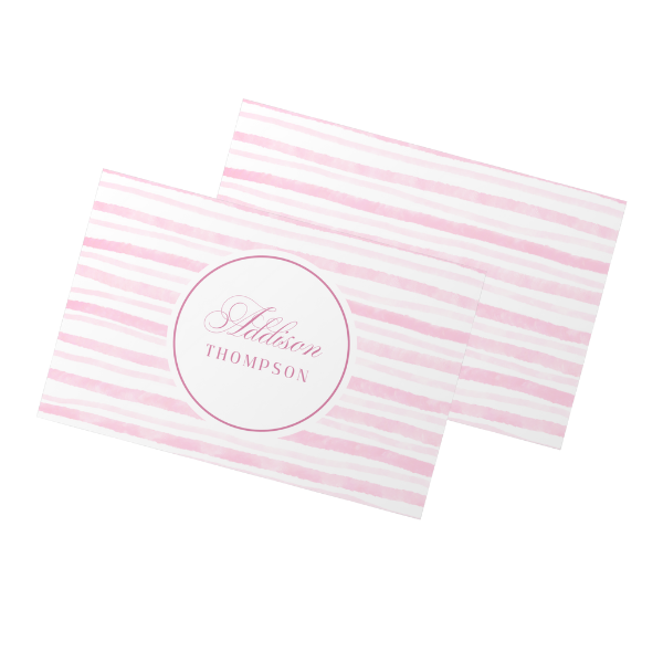 Pink and white striped towel with 'Addison Thompson' name on a white background