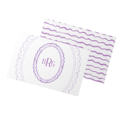 White card with purple decorative elements and initials on a white background