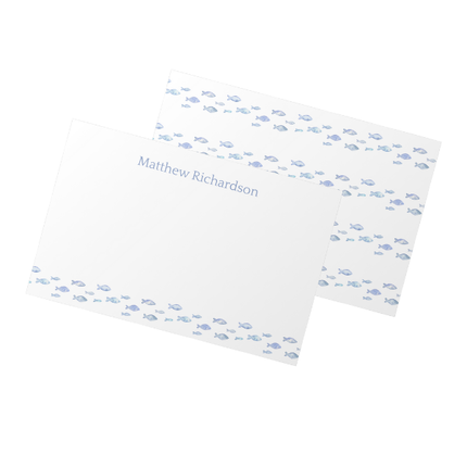 Personalized notepad with blue fish pattern on a white background