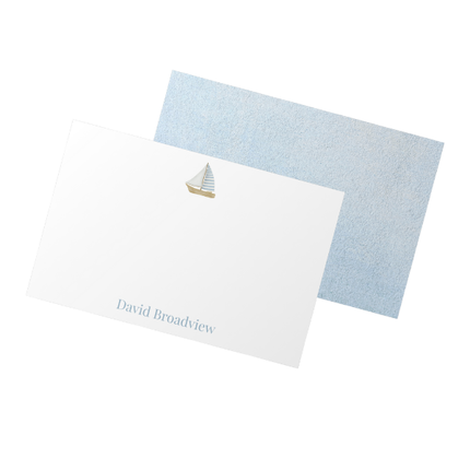 Note card with sailboat design and complementary blue blank side on a white background